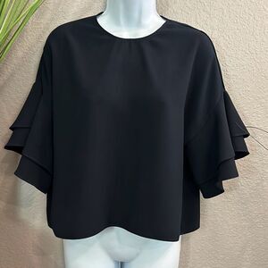 #324 Boutique, black short ruffle sleeve Top size medium
